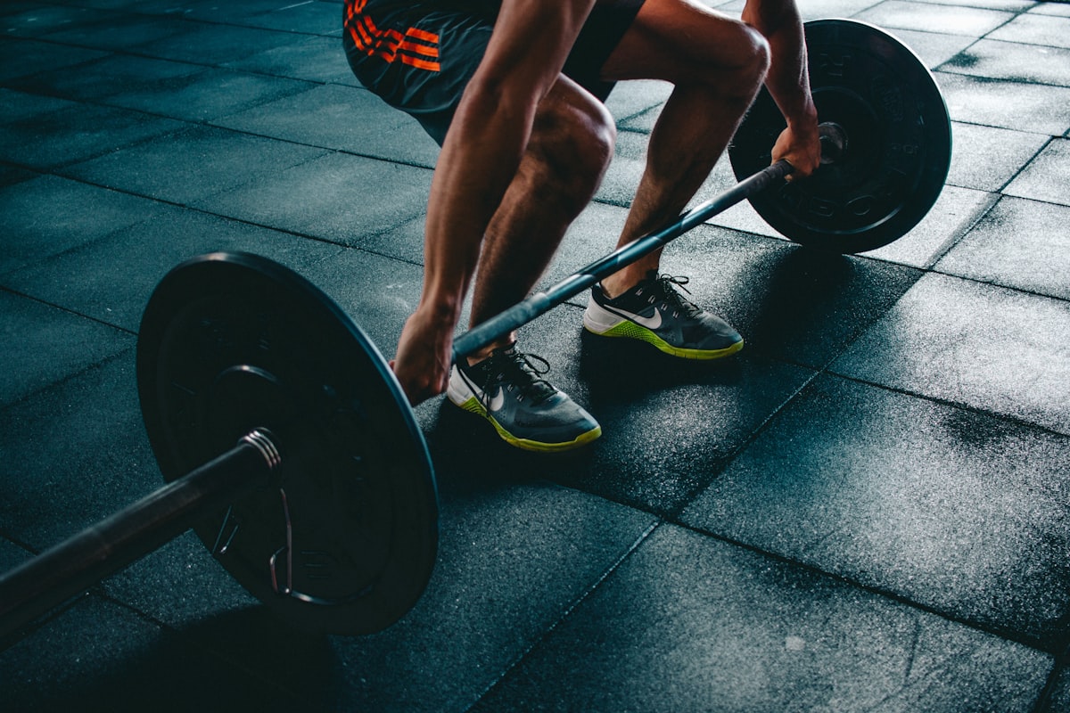 Athlete lifting in compression wear